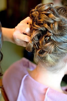 Hairdresser Putting Bride's Hair Up